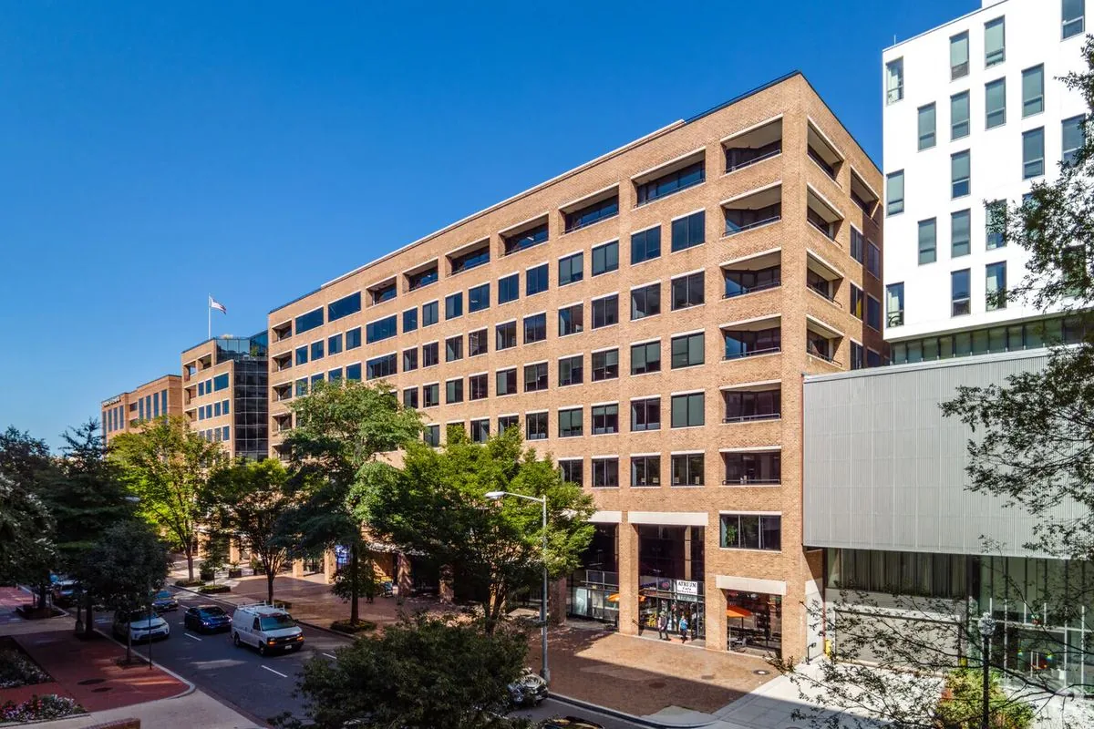 1255 23rd Street NW, an 8-story brick office building in the West End